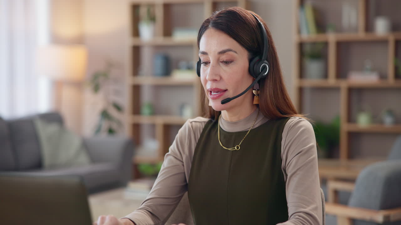 Woman in a Headset Talking on a Video Call