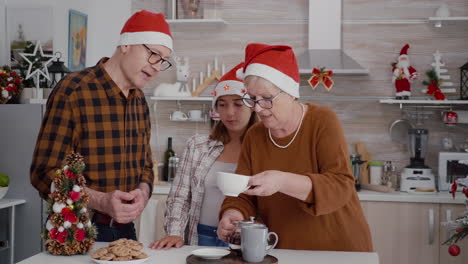 happy family celebrating christmas holiday together eating delicious chocolate baked cookies