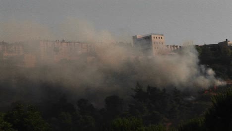 Smoke-rises-from-a-rocket-attack-in-Northern-Israel-during-the-Israel-Lebanon-war