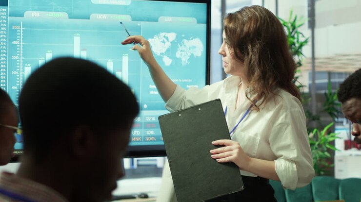Business associates reviewing key performance indicators within the enterprise