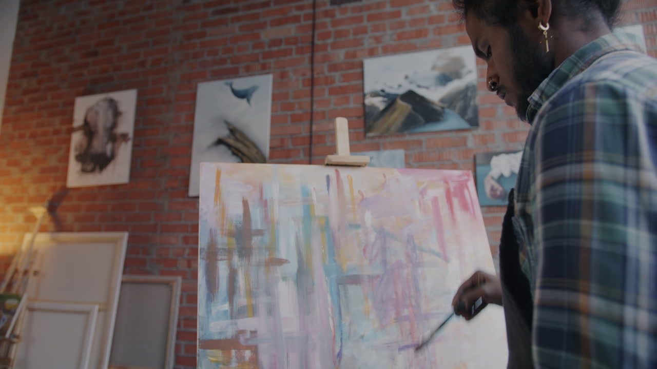 Artist Painting Abstract Art in Studio