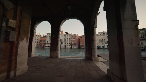 venetian canal view from an archway