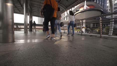 pedestrian feet on footbridge