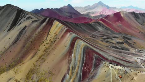 rainbow mountain, peru, pan right to left aerial shot