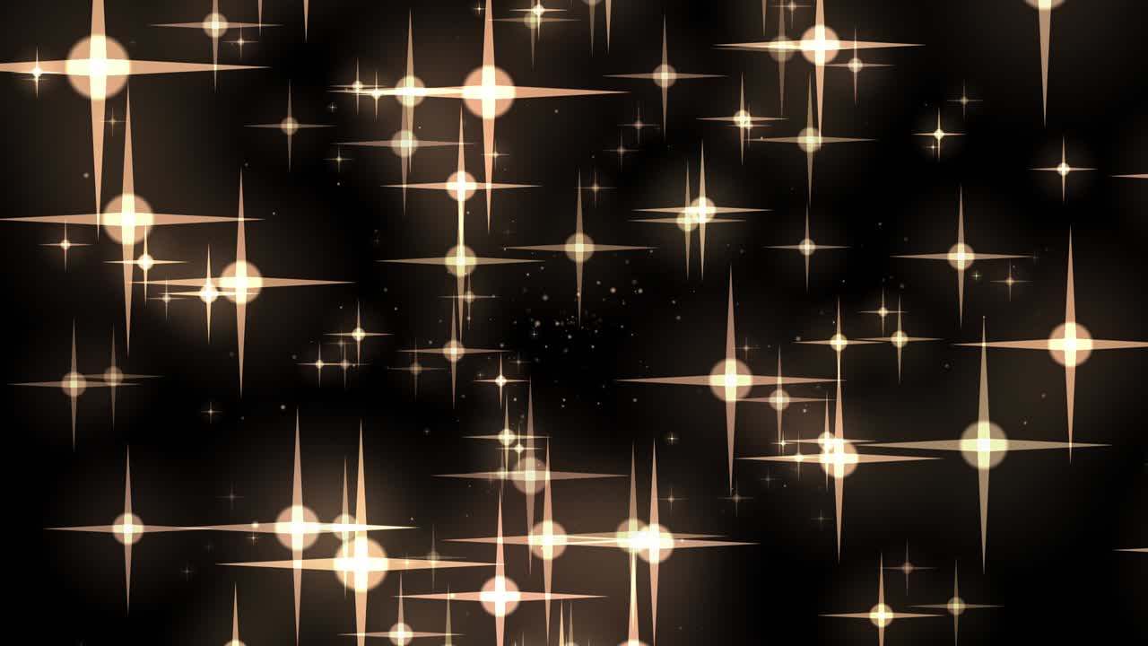 Defocused gold colored particles background 4k