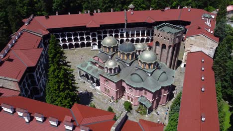 drone view inside wonderful rila monastery on sunny summer's day - bulgaria