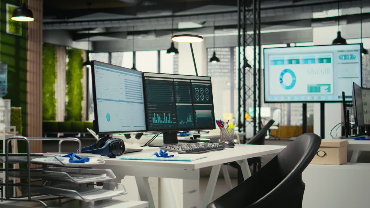 Vertical Video Empty corporate workstations with computers running financial diagnostics