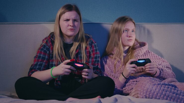 Teen Girls Gaming Together