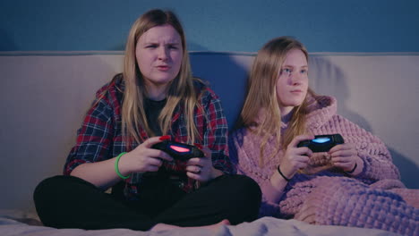 teen girls gaming together