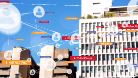 animation of network of people icons and media notifications over city buildings and blue sky