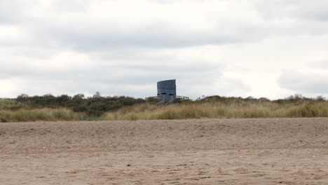 pillbox war defence observation tower on the coast from world war two