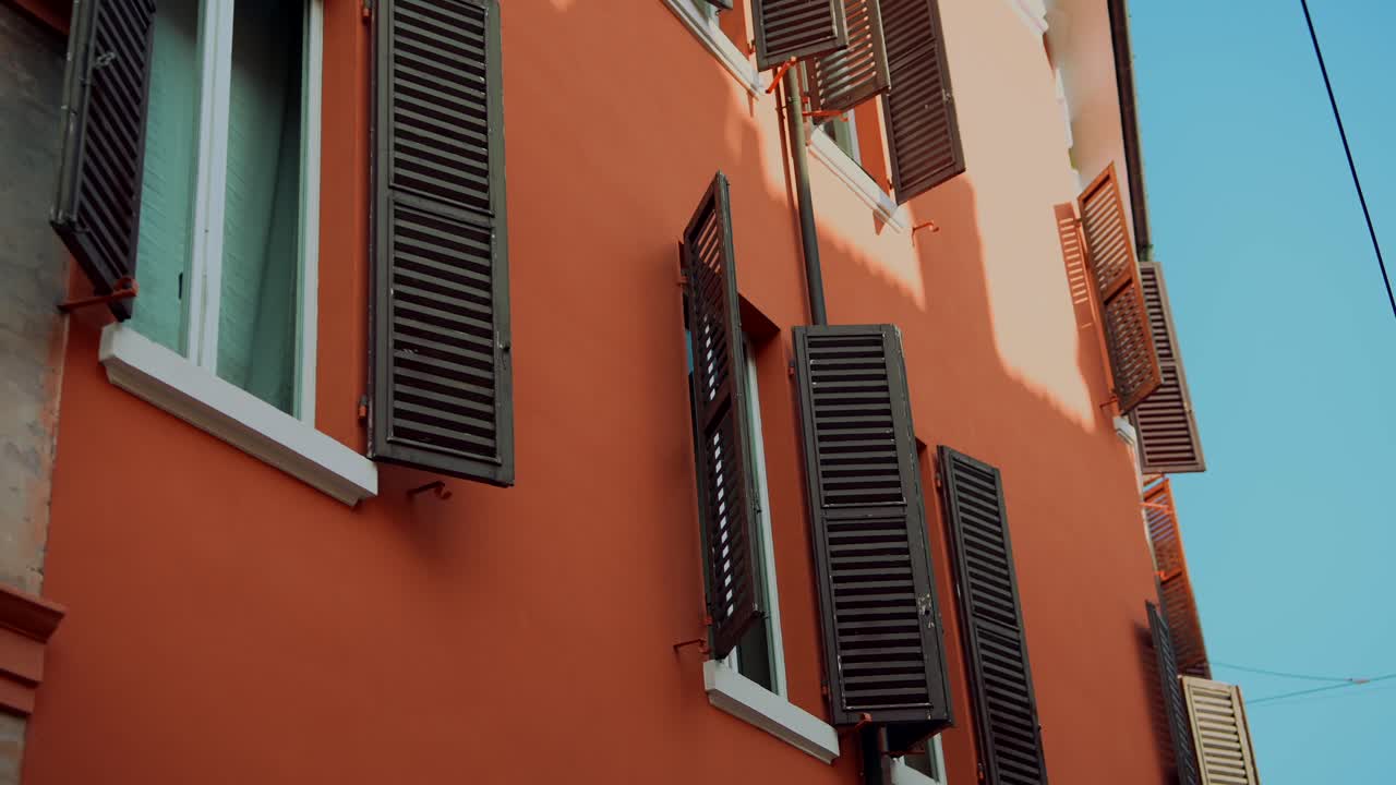 Orange Building with Shutters