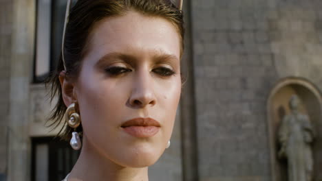 close-up view of elegant woman with sunglases on her head