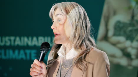woman giving a speech about climate change and sustainability