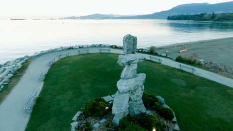 vancouver's totem in english bay at sunrise