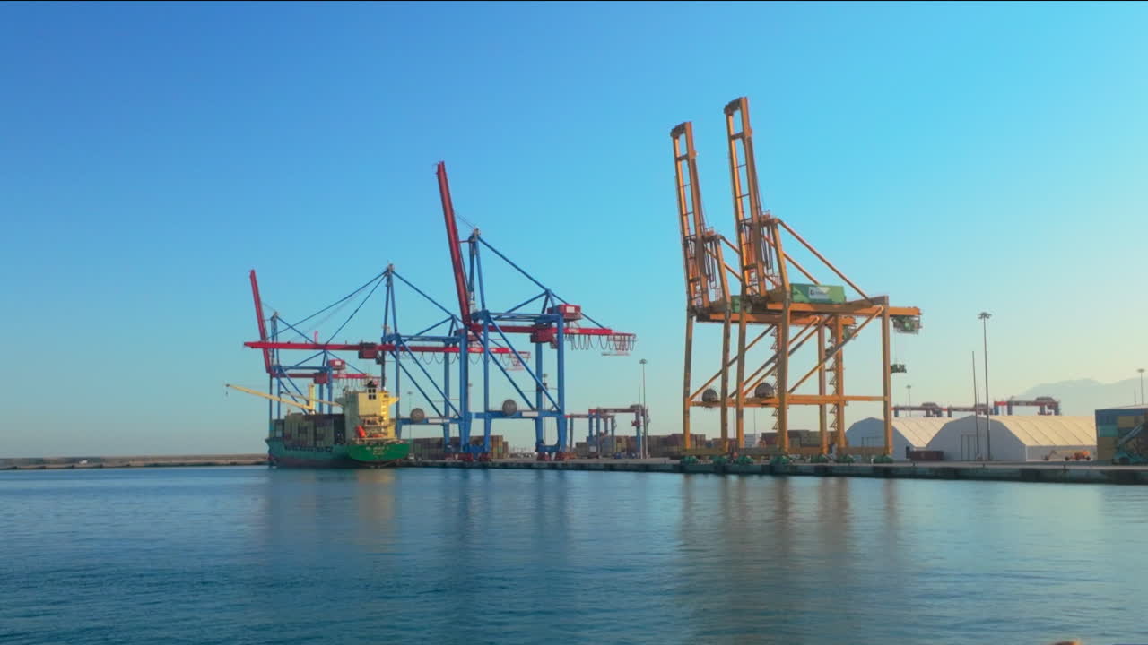 Container Ship at Port with Cranes