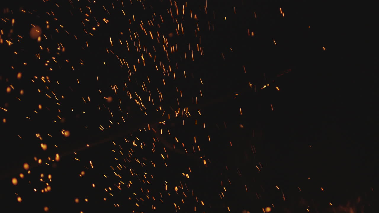 A flurry of sparks in the darkness