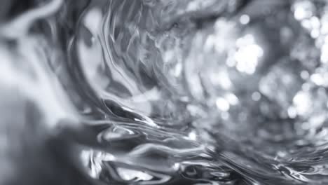 water moves in a glass in slow motion. abstract water background. seamless loop 3d render