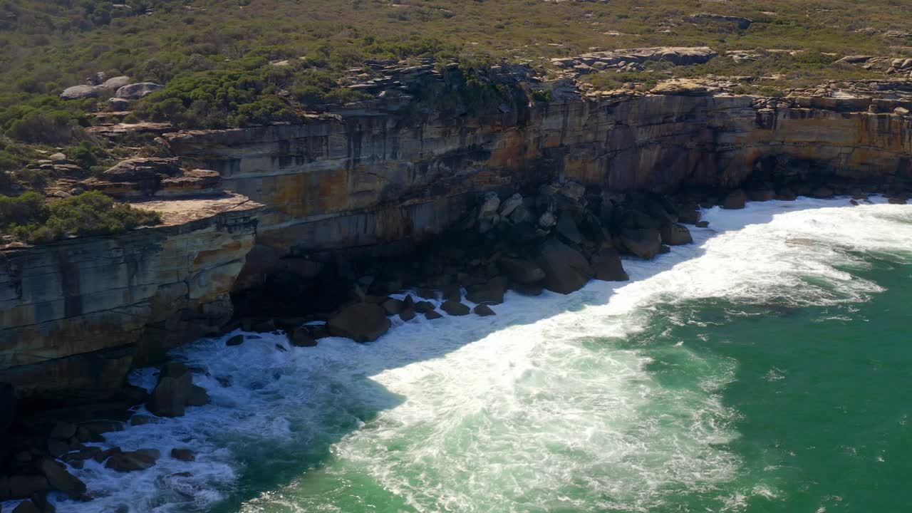 Ocean Coastline With Breaking Waves On Cliffside At Royal National Park In Sydney, New South Wales, Australia