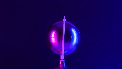 fi futurista globo dorado girando con efectos de luz cyberpunk