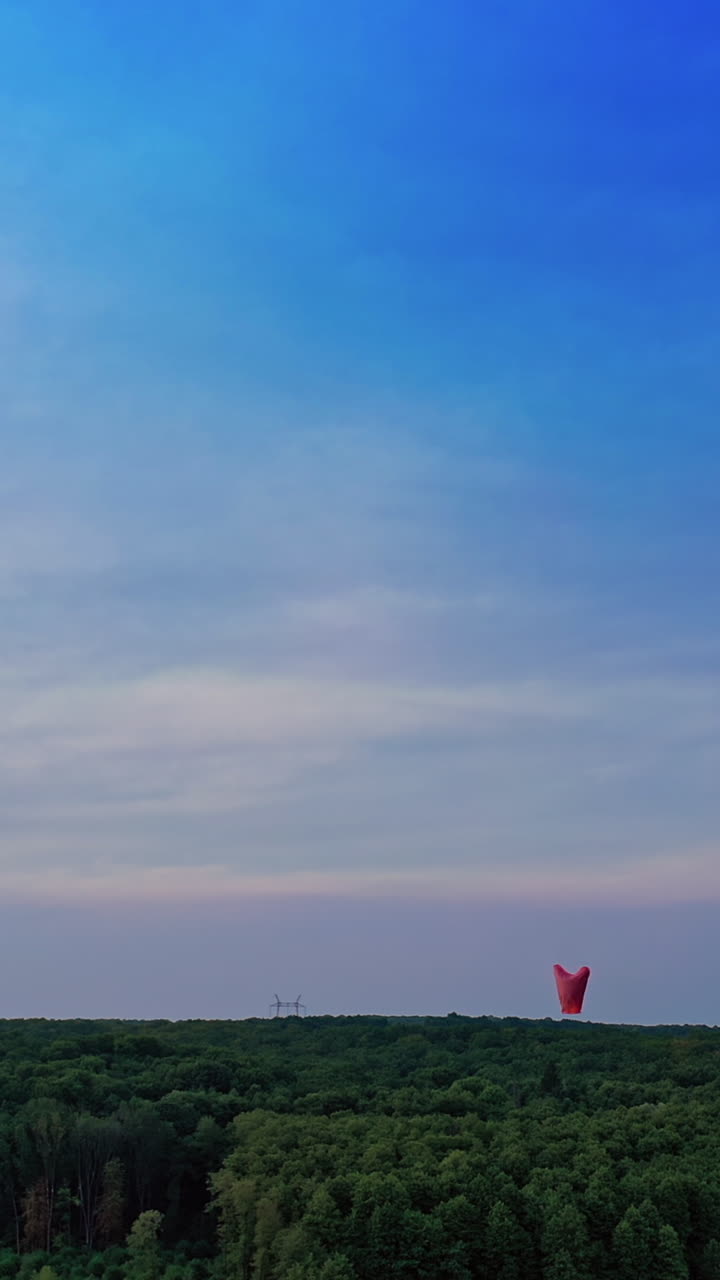 Air ballon in the sky. Light up lanterns flying to the sky. Vertical video