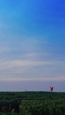 air ballon in the sky. light up lanterns flying to the sky. vertical video