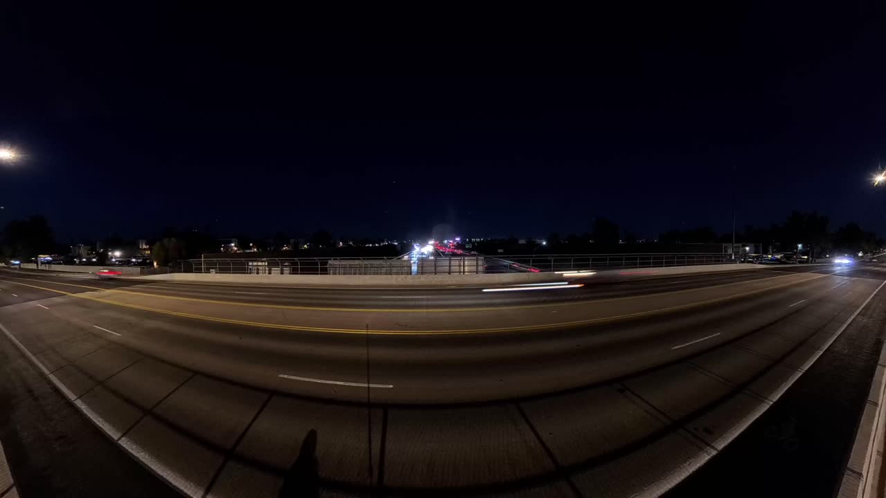 Street night Time Lapse of bridge over Arizona highway 60 in Gilbert and Mesa Arizona USA.