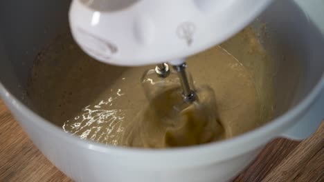 Woman-Using-Electric-Mixer-for-Preparing-Food