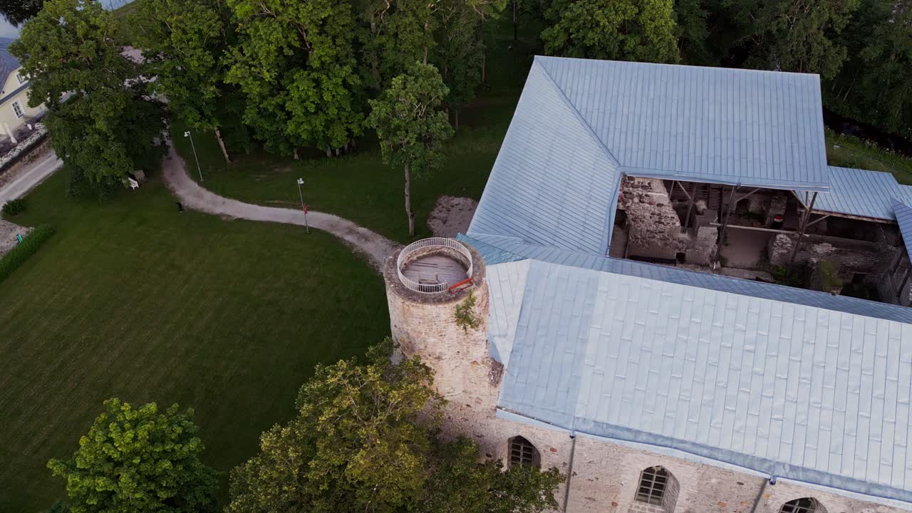 Padise Monastery ruins filmed from above highlight the detailed medieval stone architecture and layout of this historic Cistercian site nestled within the Estonian countryside of Harju County