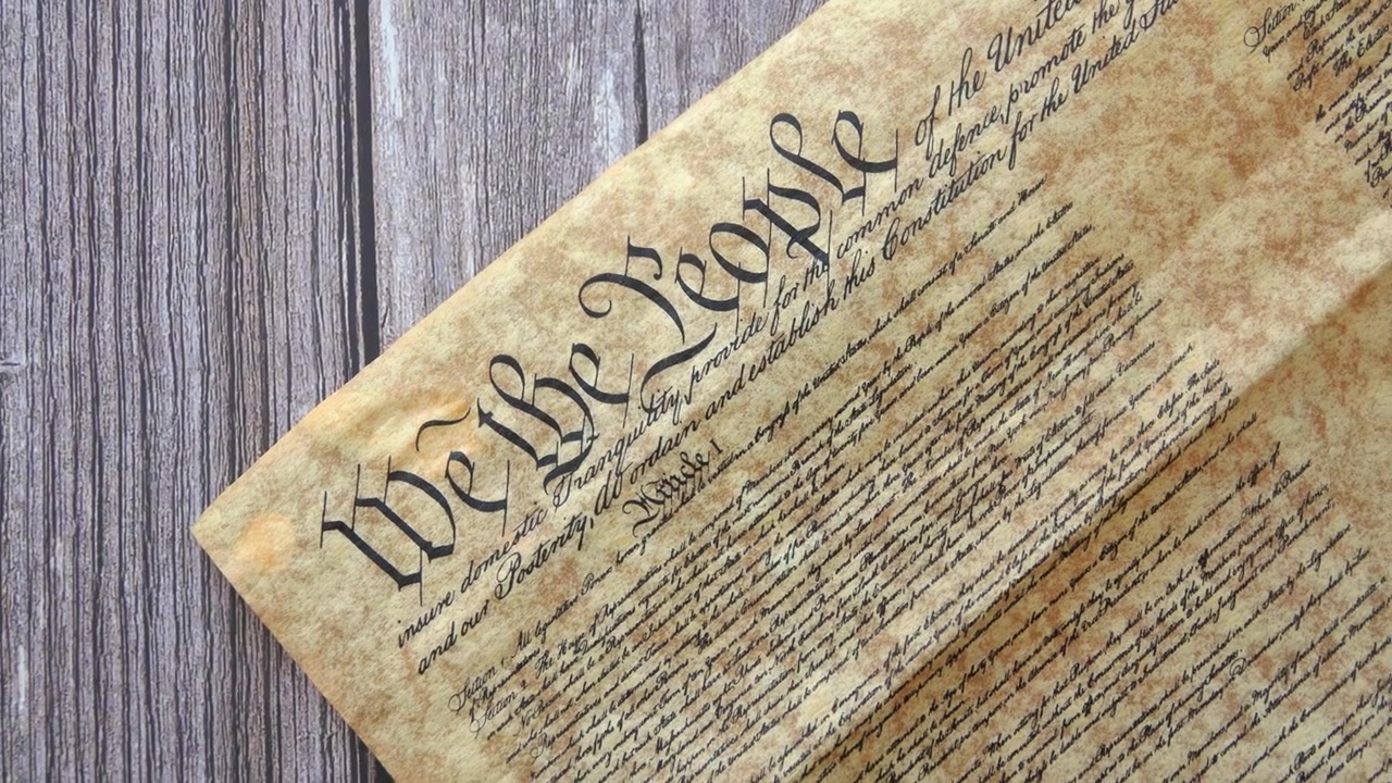 Reading the US Constitution honoring American freedom liberty democracy patriotism and the enduring spirit of the founding fathers and the United States Republic