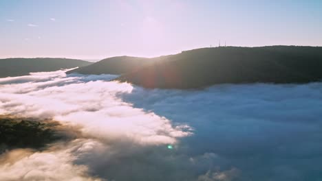 sunrise over foggy valley during sunrise