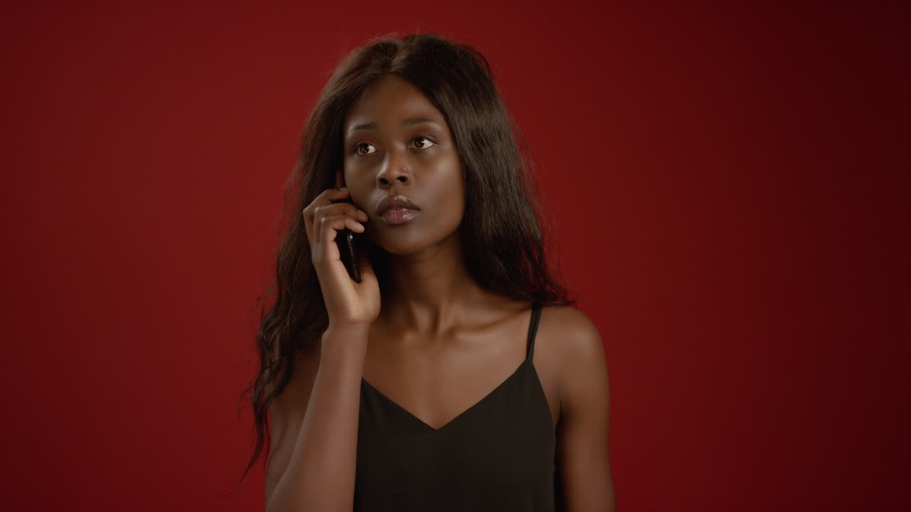 Woman Receives Bad News on Phone
