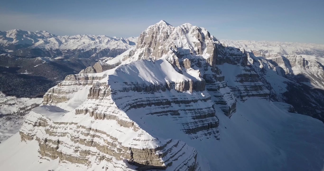 Aerial view of Groste mountain, Dolomites, Alps, Brenta Group, peak in winter, an aerial view in a sunny day