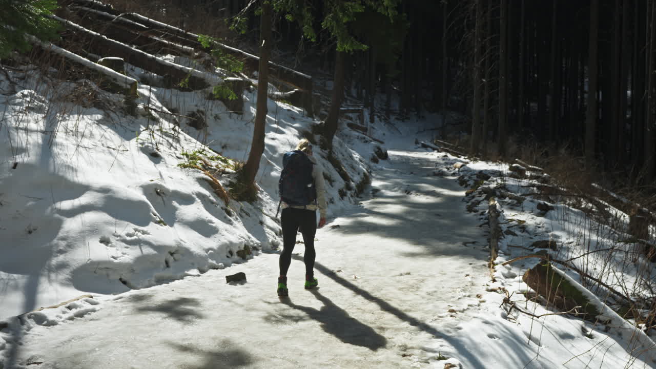 Female Hiker Walking On Hiking Trail, Tatra Mountains In Europe - Wide Shot