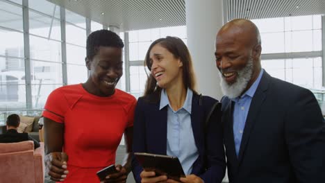 business people discussing over digital tablet in office 4k