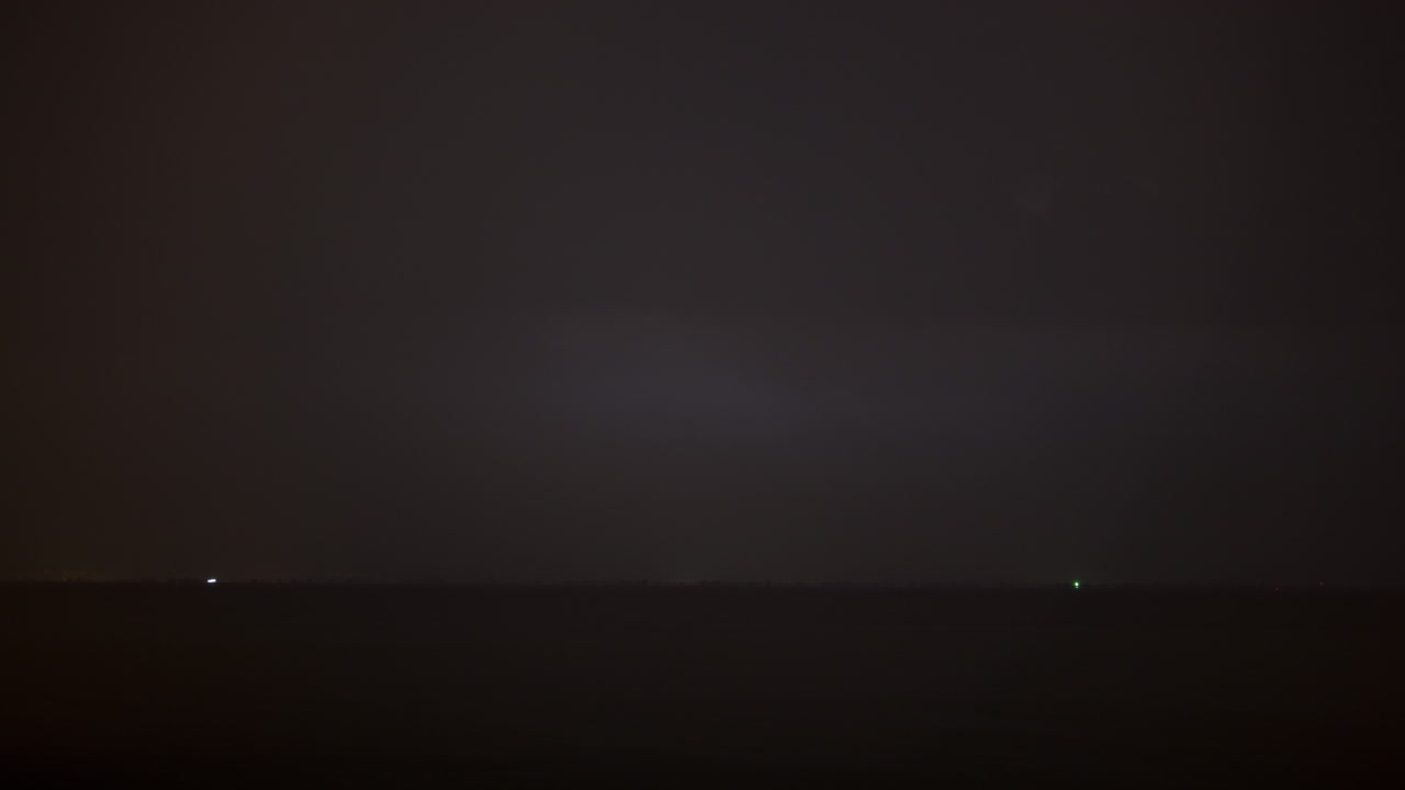 Timelapse of night thunderstorm over the sea