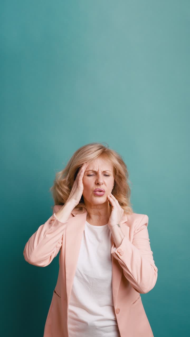 Mature Woman Suffering from Severe Headache or Migraine