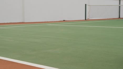 Tennisspieler-Fällt-Auf-Den-Platz