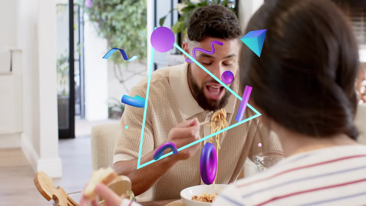 Man with beard starting meal, eating pasta and gesturing while AR tech triangle shifting, chatting