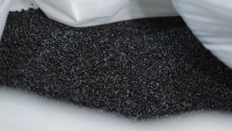 black polymer granules in a bag