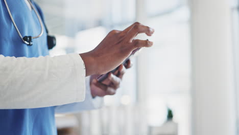 Black-man,-phone-and-doctor-typing-in-social