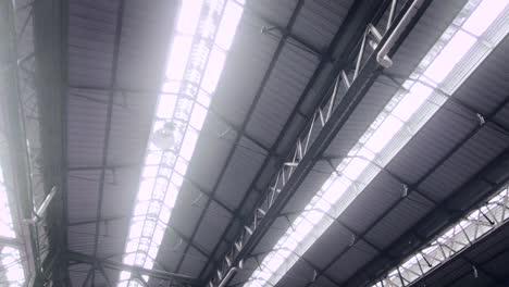 Lower-shot-of-train-station-steel-ceiling