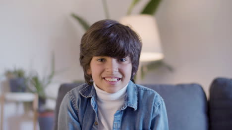 portrait shot of smiling hispanic boy