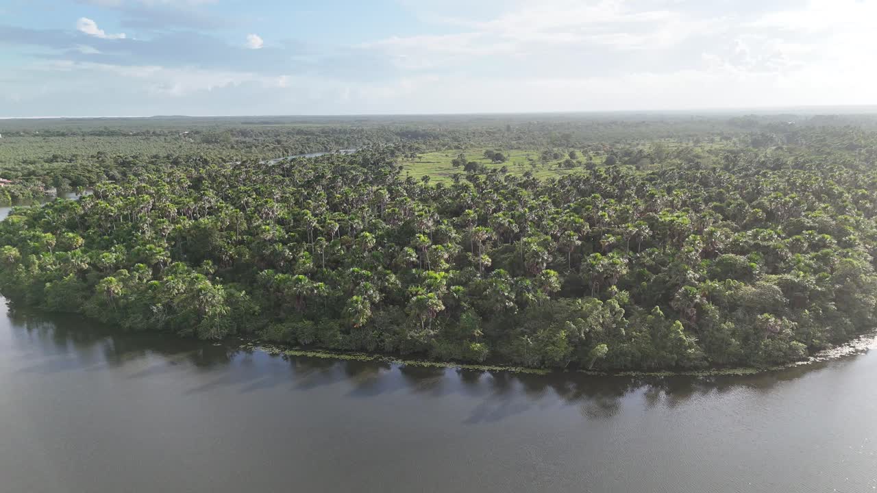 Preguicas River At Barreirinhas In Maranhao Brazil. Boat Sailing. Northeastern River. Preguicas River At Barreirinhas. Sunset Riverside City. Coastal Landscape. Nautical Vessel