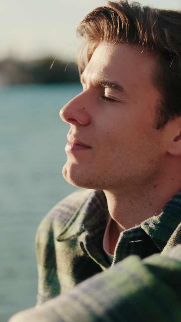 Young Man Enjoying Sunset Over Guadalquivir River