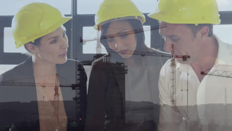 animation of a construction site over a group of caucasian engineers