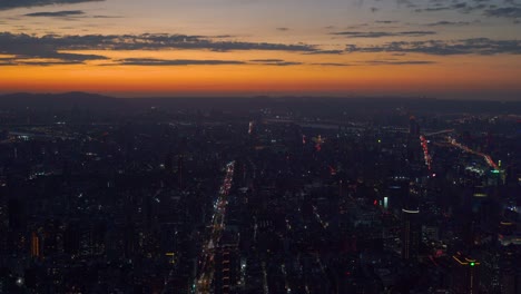 wide open panorama view over taipei at sunset with city lights