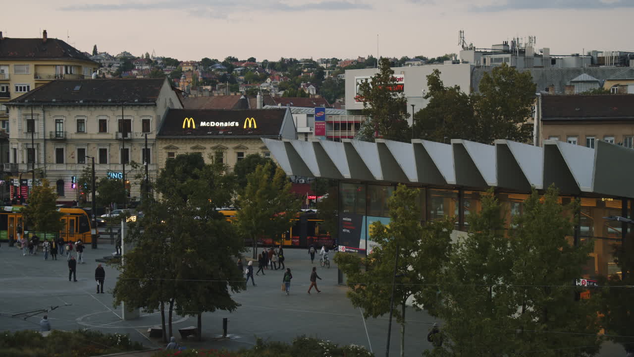 Hungary, Budapest, downtown September 20, 2022. Vehicles depart and arrive from Szell Kalman Square. A subway building is visible.