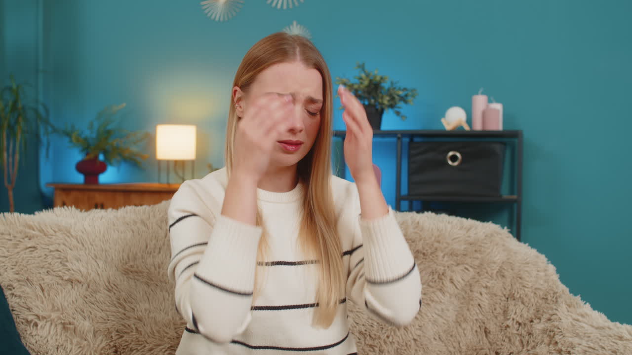 Caucasian woman looking shocked and disappointed after reading bad news or losing lottery on phone