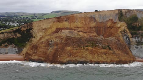 aerial paralax shot of the major cliff land fall at seatown dorset england